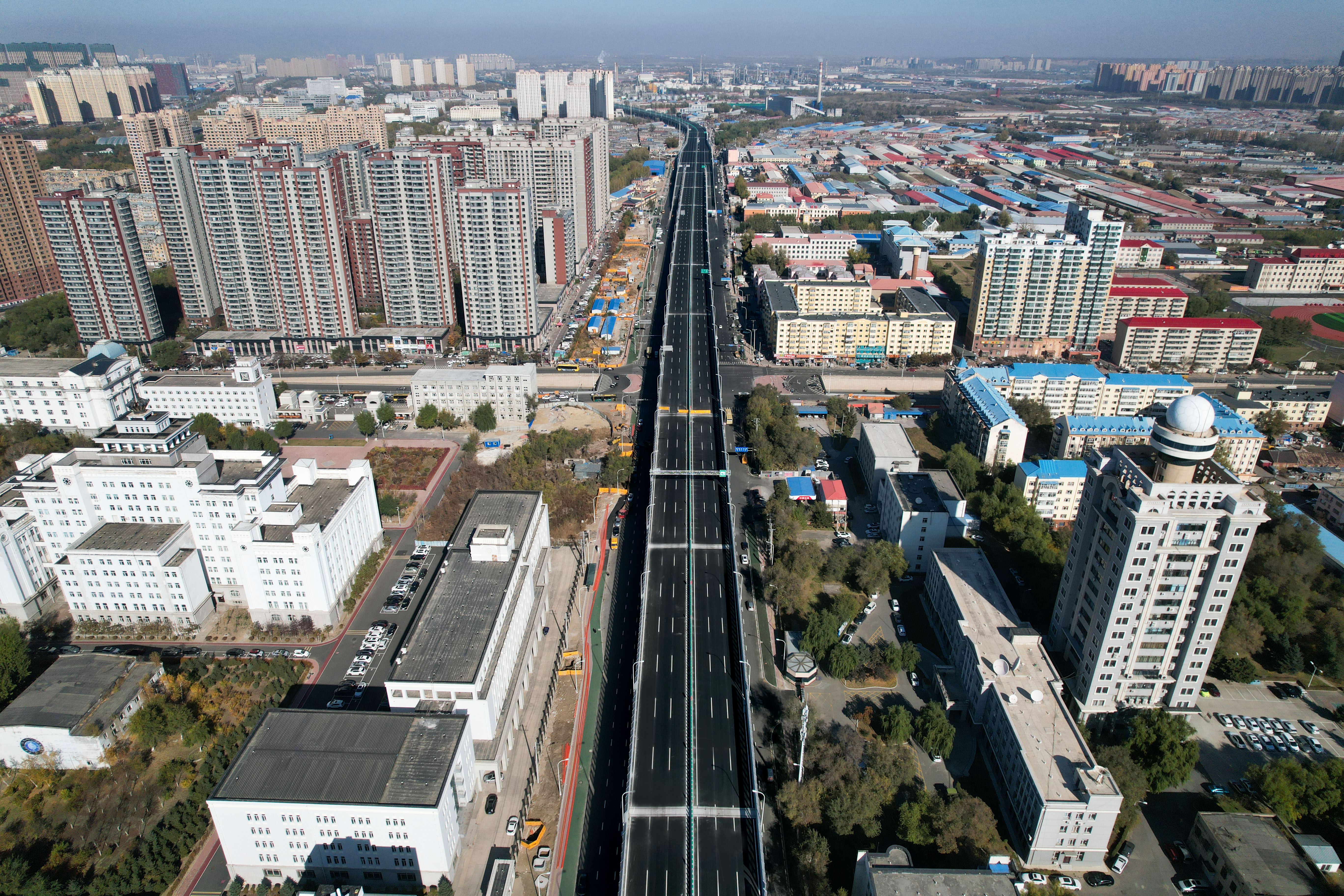 公司承建的哈尔滨市东三环快速路工程完工通车！(图2)